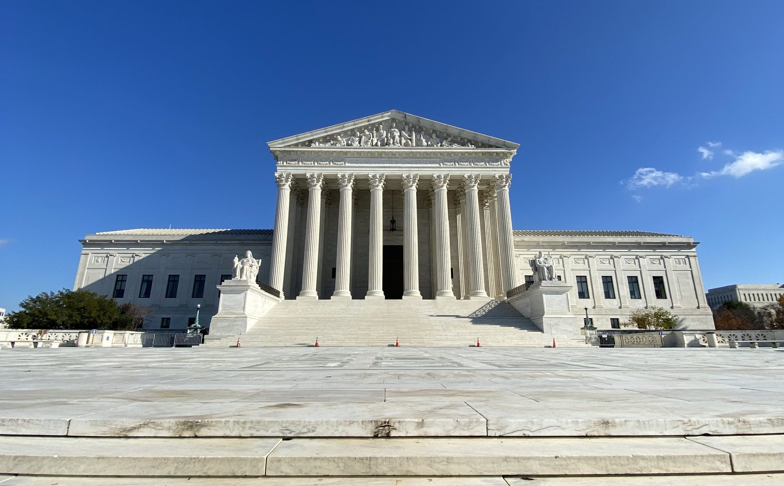 front facade of Supreme Court against blue sky