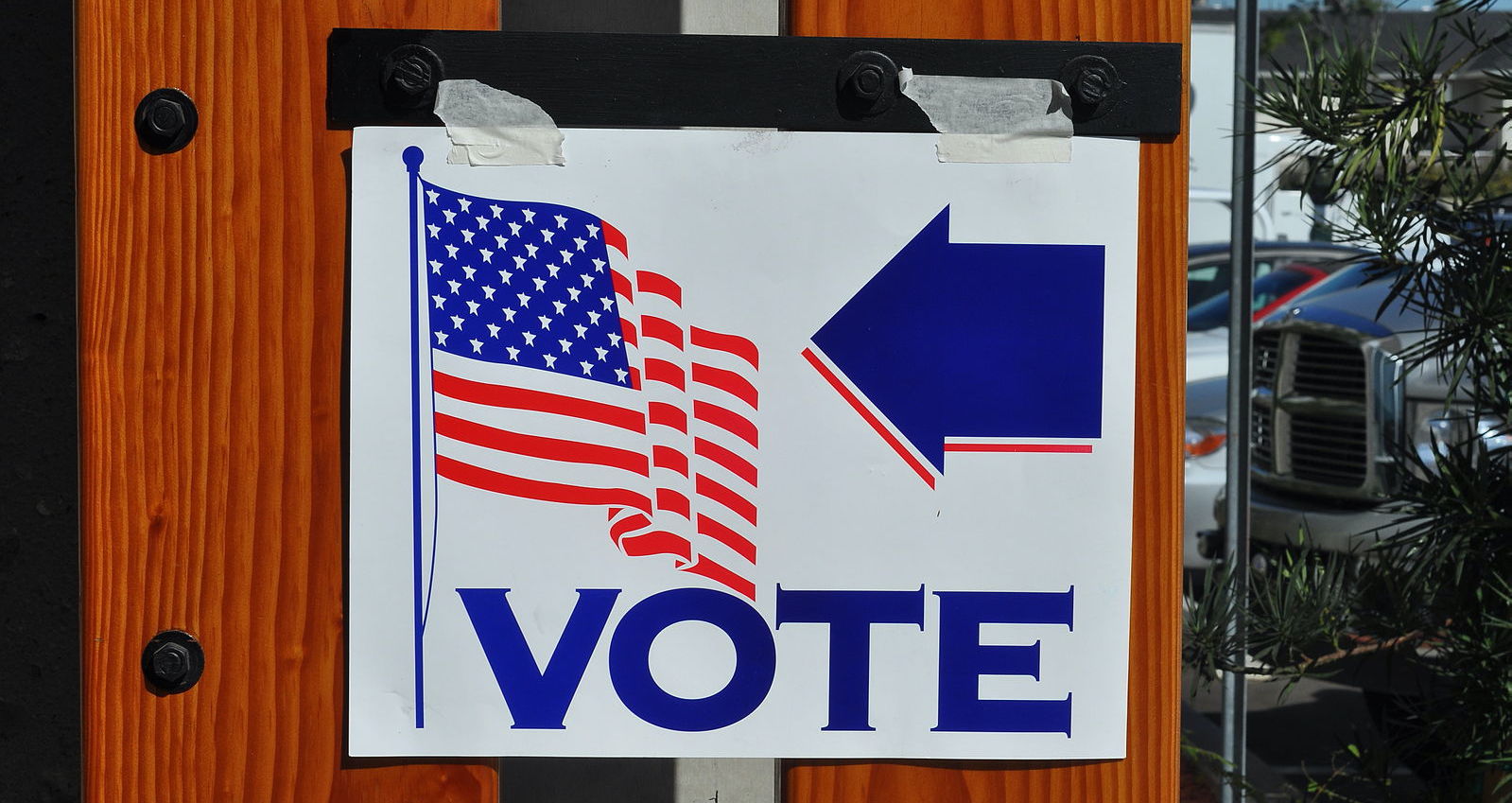 voting sign with American flag