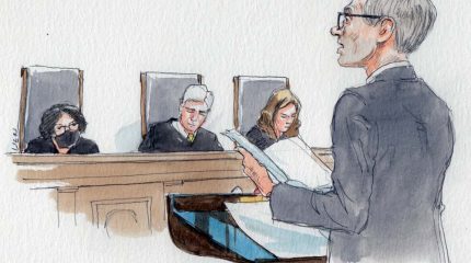 sketch of man at lectern holding papers with three justices in background