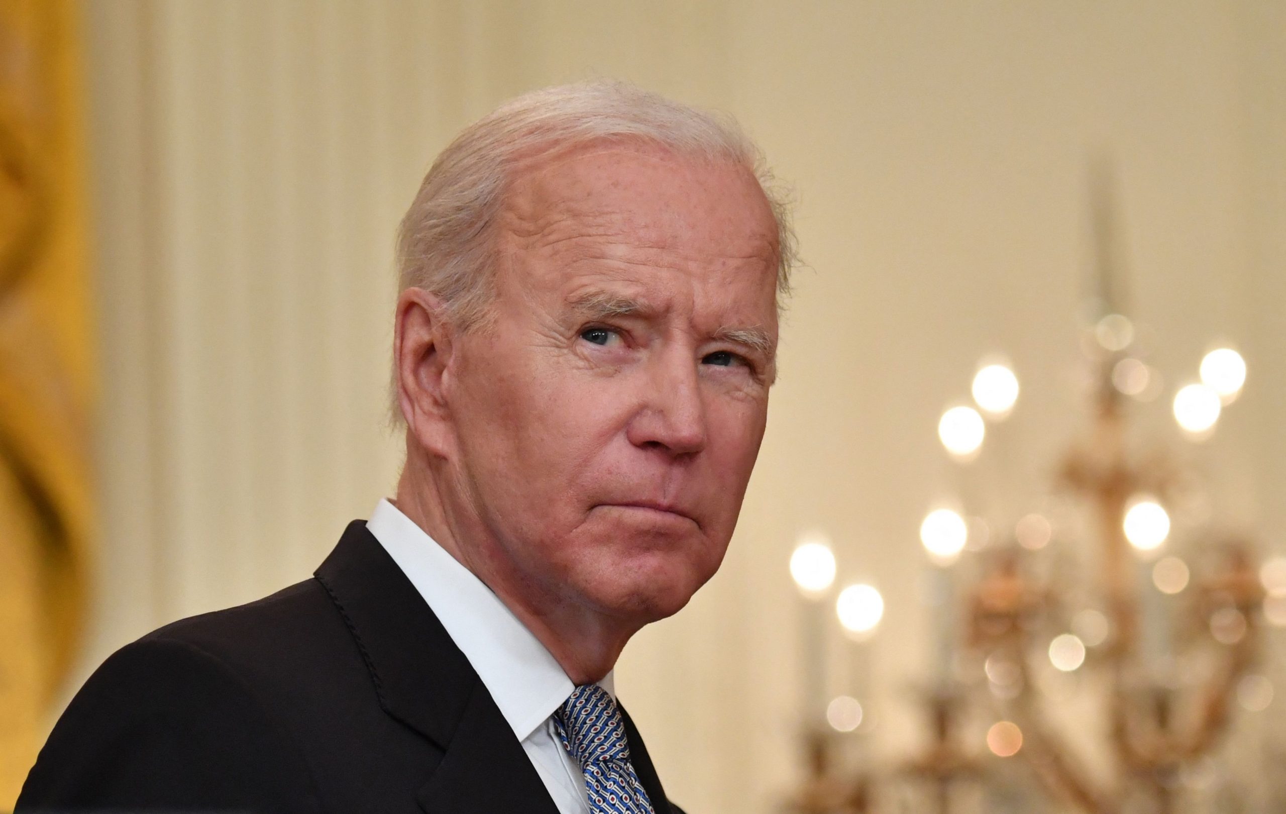 close-up view of Joe Biden's face showing stern expression