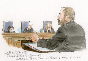 Man arguing in front of three justices.