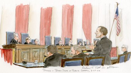 man arguing in front of eight justices with Justice Thomas' empty chair.