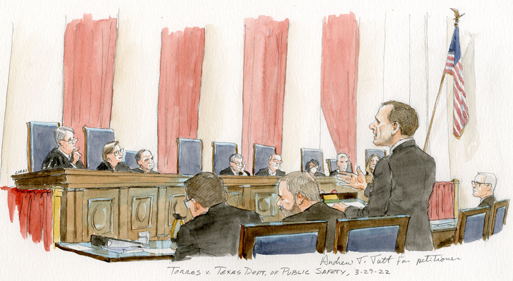 man arguing in front of eight justices with Justice Thomas' empty chair.