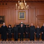 At Jackson's investiture, the courtroom brims with politicians as the justices find their new seats