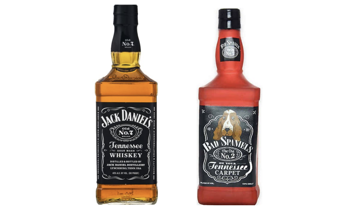 side by side comparison of jack daniel's whiskey bottle and similar-looking "Bad Spaniels" dog toy