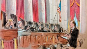 Sketch of a man in spectacles and black suit arguing before a full bench. Justices Gorsuch, Sotomayor, Kavanaugh and Jackson all gesture with their hands.