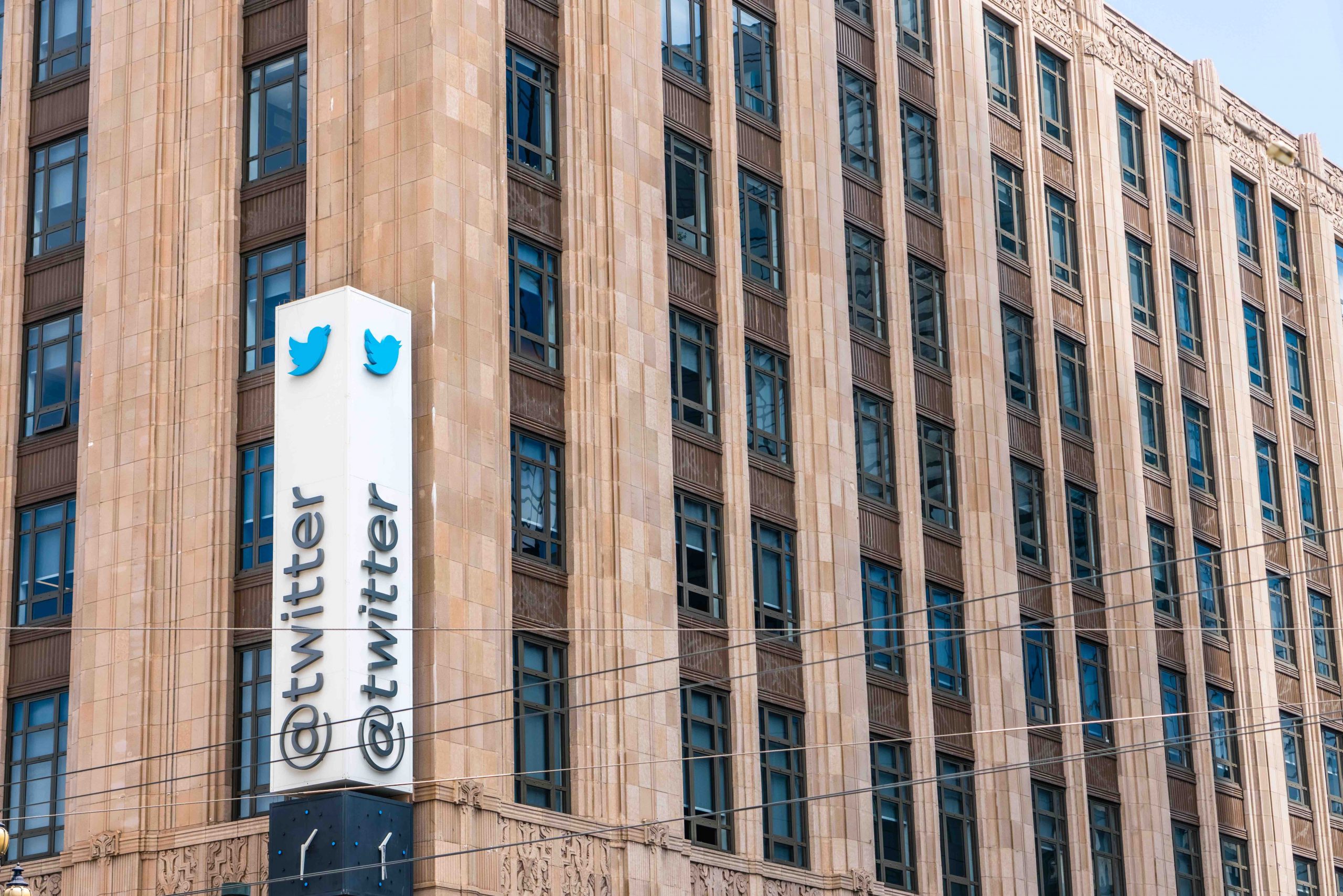 Office building with "@twitter" sign