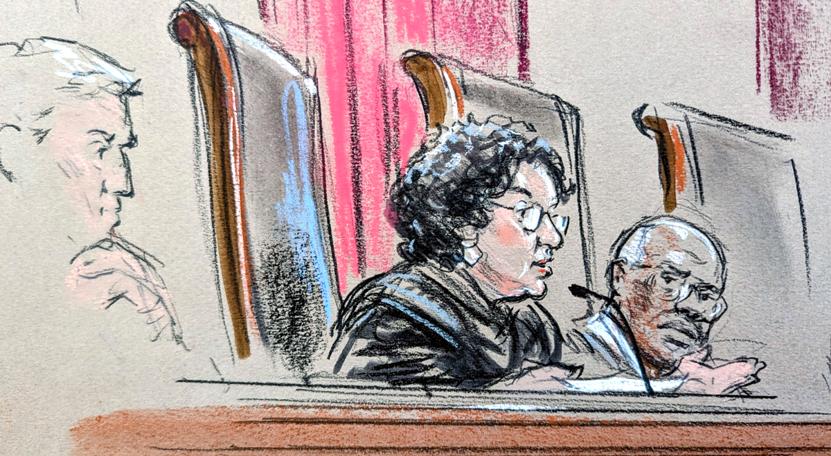 Justice Sotomayor speaking from the bench while Justice Thomas looks on.