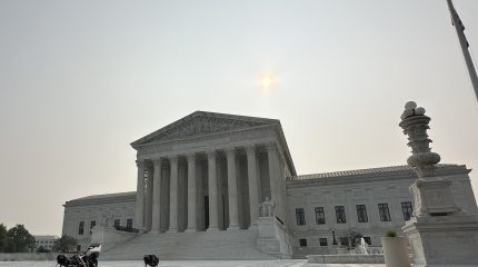 the Supreme Court building at dawn