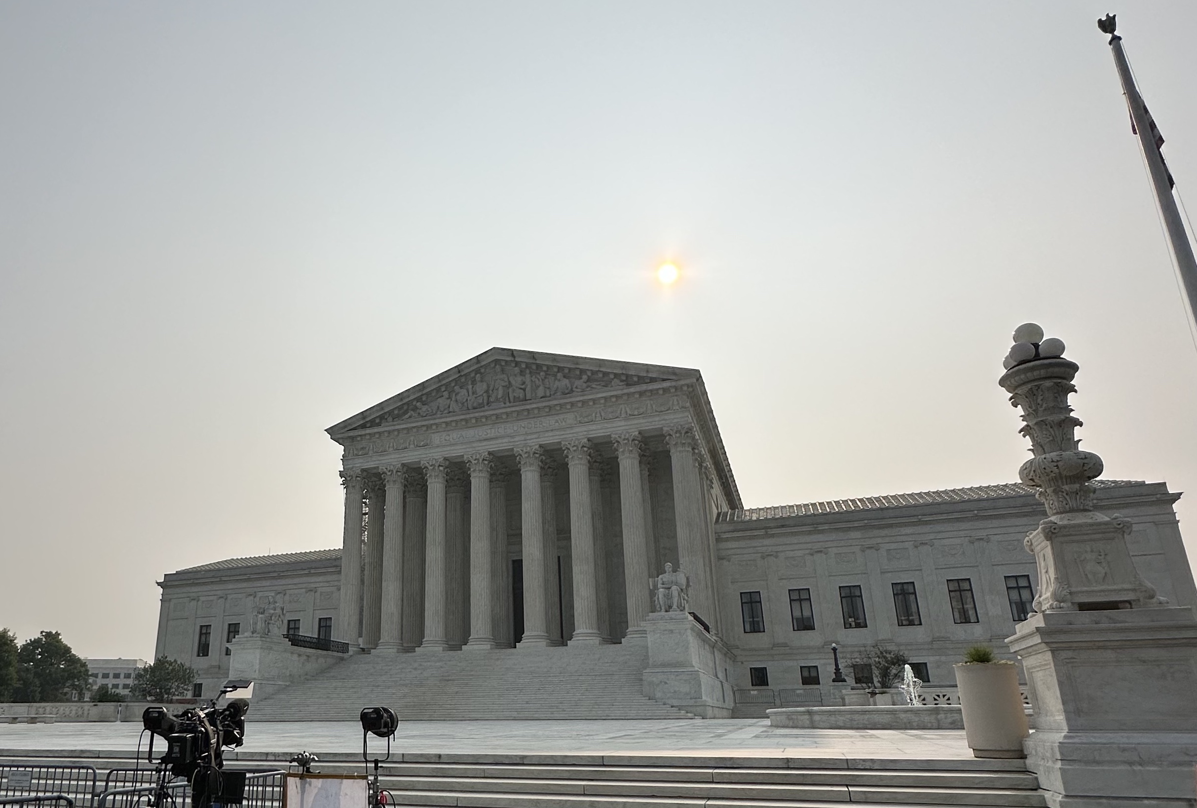 the Supreme Court building at dawn