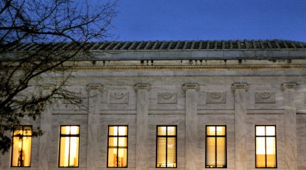 Windows in the supreme court building at night