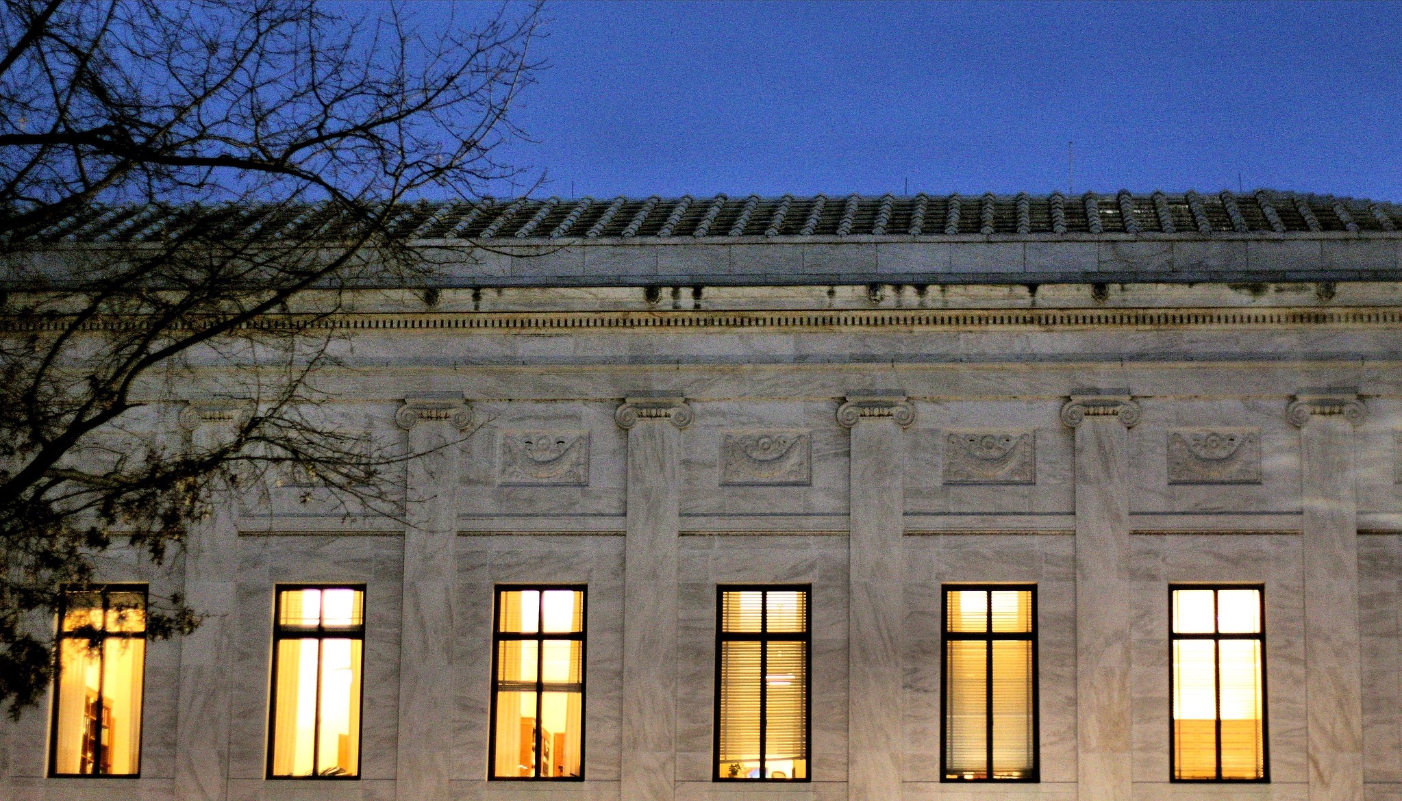 Windows in the supreme court building at night