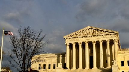 front facade of Supreme Court illuminated in winter sun
