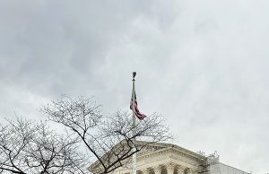 cloudy sky, flag, and supreme court