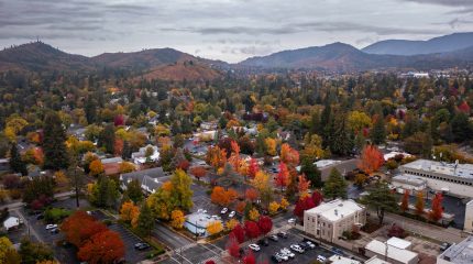 Mountains and a small town in fall foliage