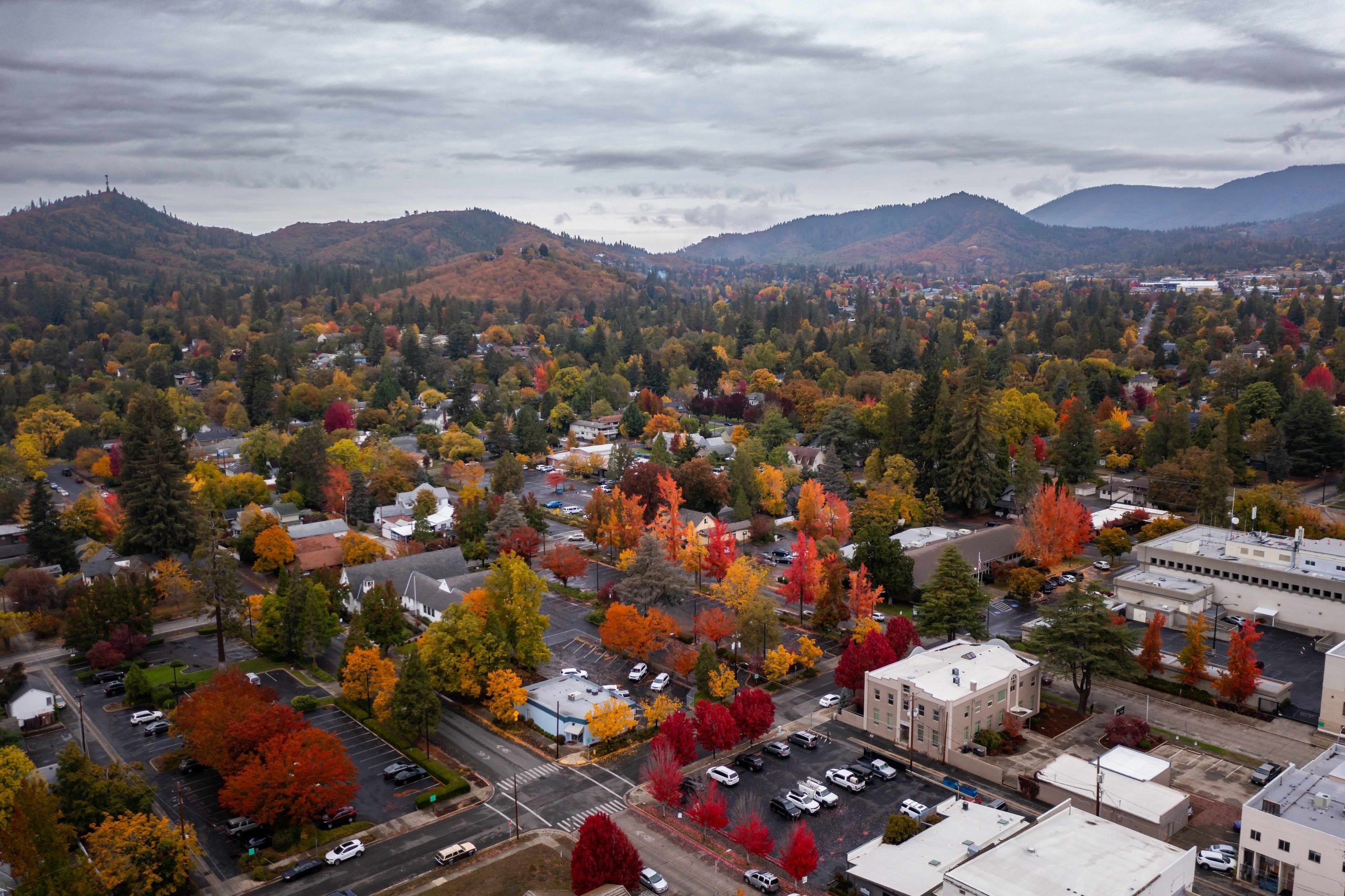 Mountains and a small town in fall foliage