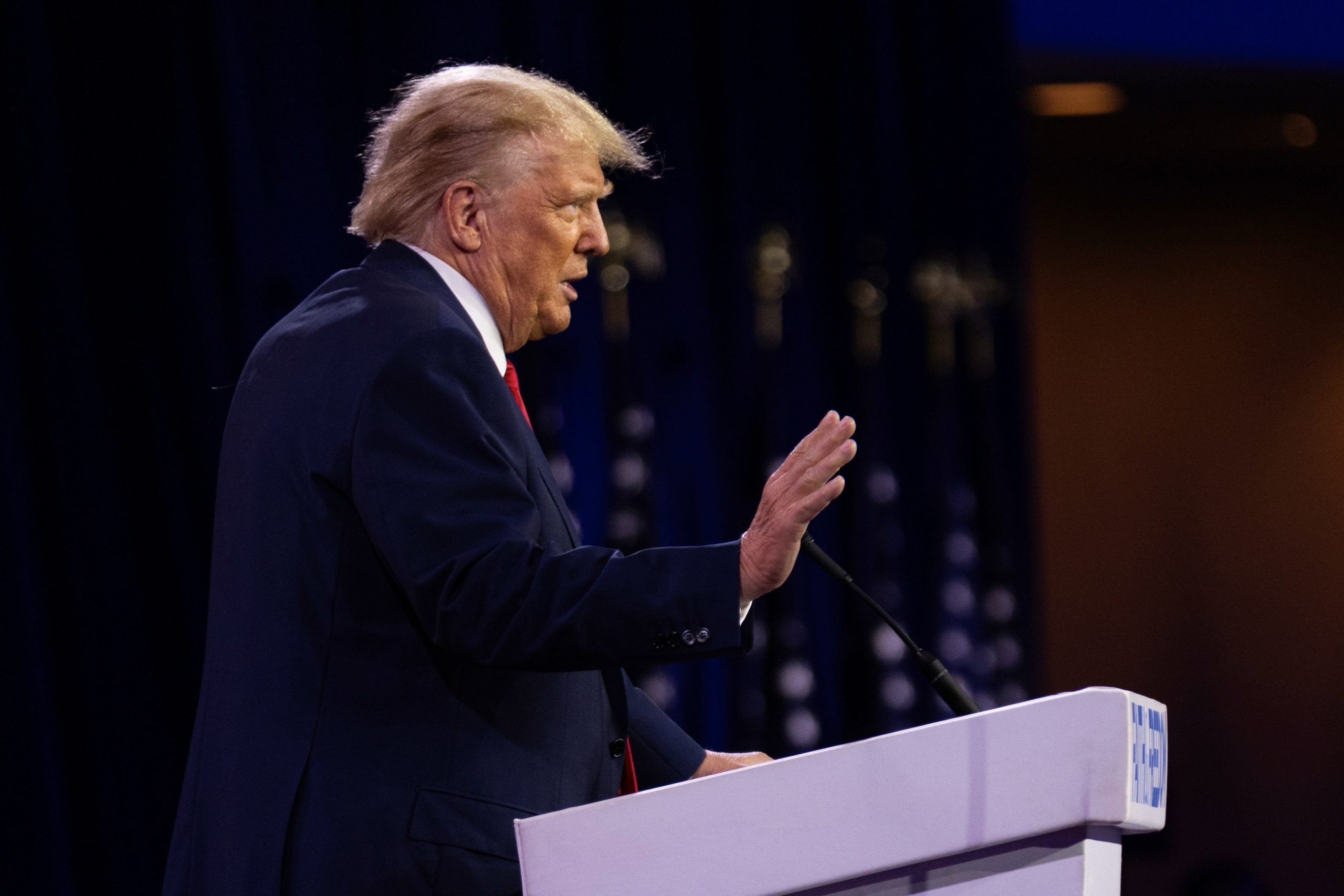 Donald Trump speaking at podium