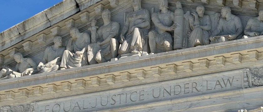 Carvings are shown at the top of the Supreme Court building