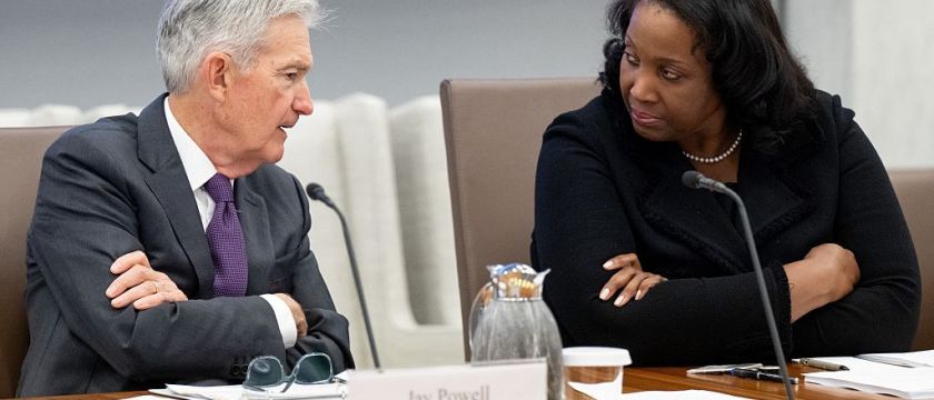 Chairman of the US Federal Reserve Jerome Powell speaks with Lisa Cook, member of the Board of Governors of the Federal Reserve, as he chairs a Federal Reserve Board open meeting discussing proposed revisions to the board's supplementary leverage ratio standards at the Federal Reserve Board building in Washington, DC, on June 25, 2025.