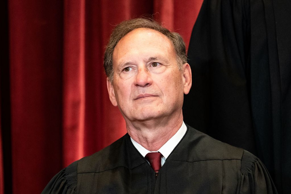 Associate Justice Samuel Alito sits during a group photo of the Justices at the Supreme Court in Washington, DC on April 23, 2021.